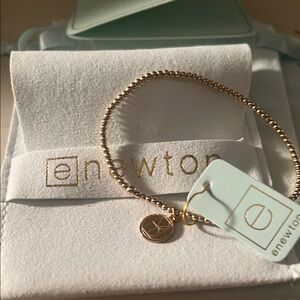 E Newton Gold Beaded Bracelet
Regular size in pouch !